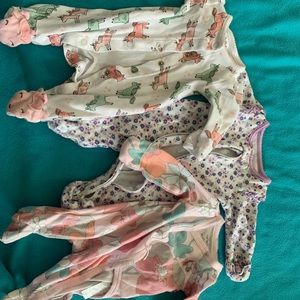 Three newborn girls sleepers. CARTERS